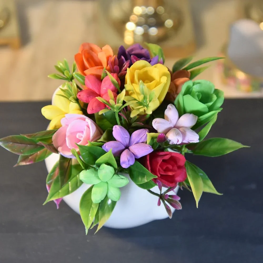 Cute small bunny rabbit planter filled small Sola flowers dyed in bright colors